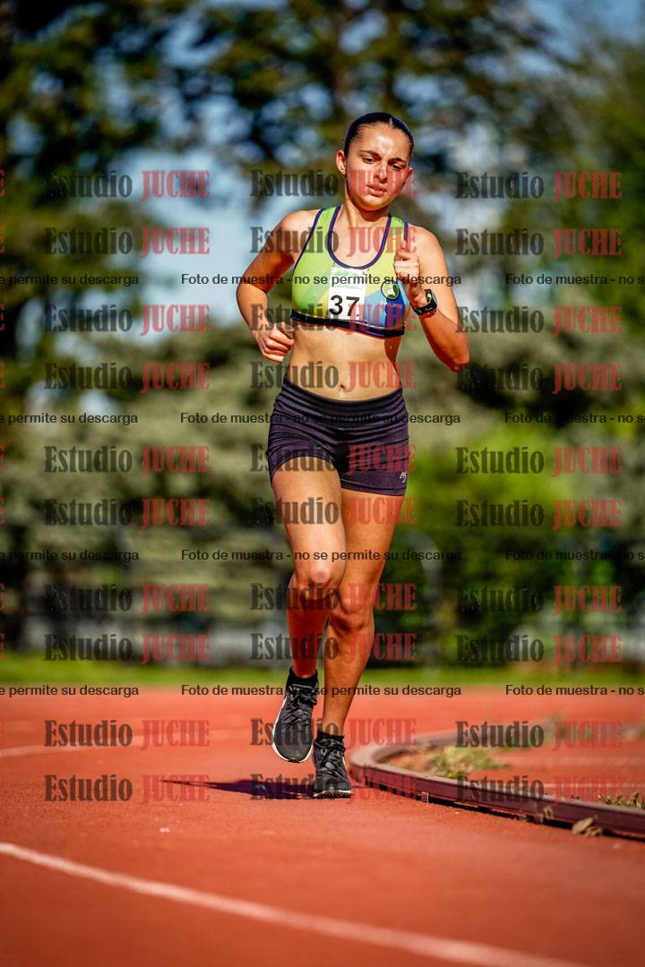 Fotos de los 5000 m llanos de mujeres y varones