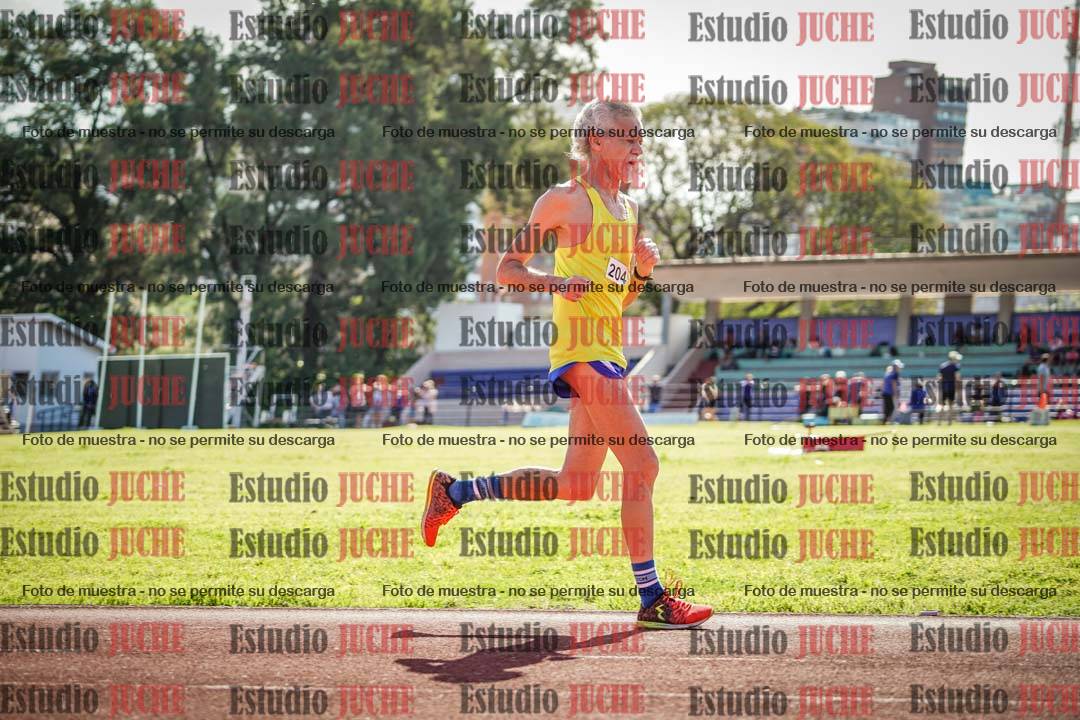 Fotos de los 5000 m llanos de mujeres y varones