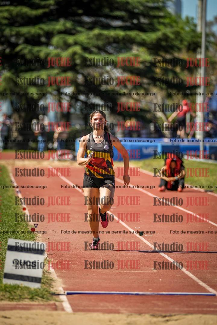 Fotos del salto en largo de mujeres