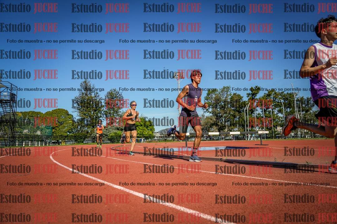 Fotos de los 5000 m llanos de mujeres y varones