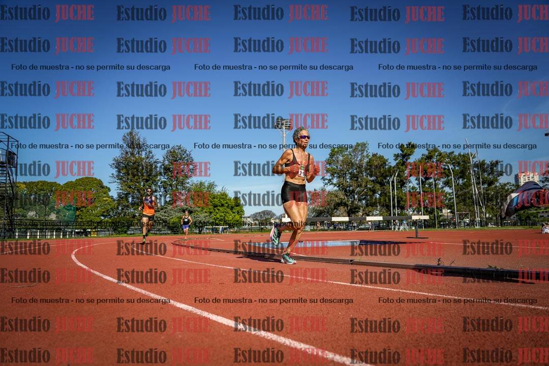 Fotos de los 5000 m llanos de mujeres y varones