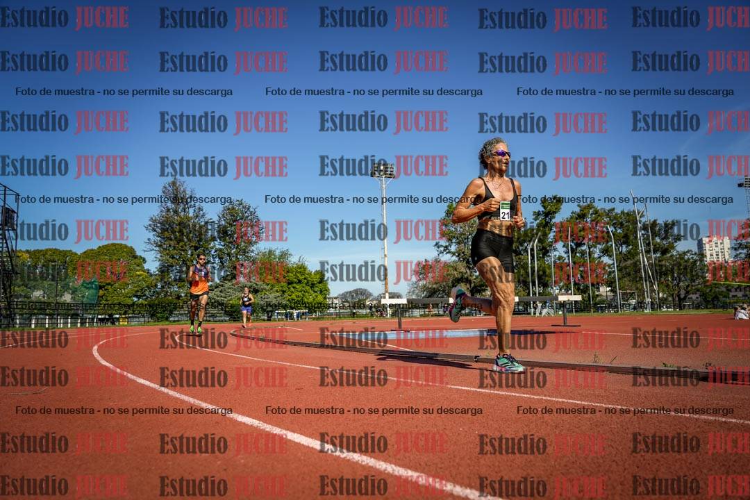 Fotos de los 5000 m llanos de mujeres y varones