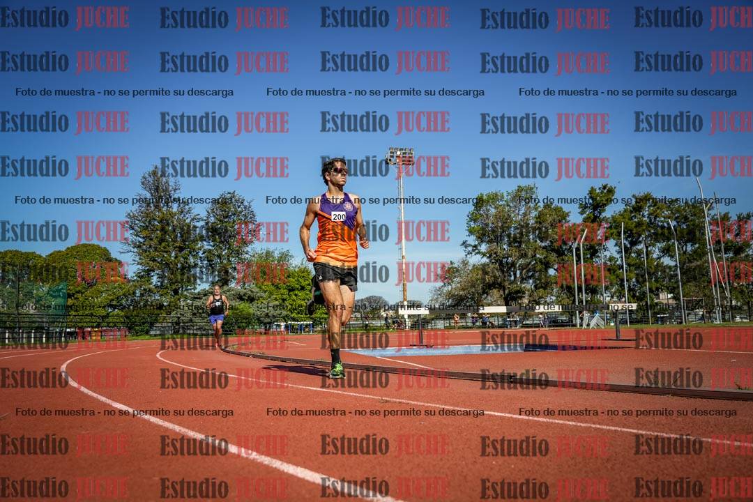 Fotos de los 5000 m llanos de mujeres y varones