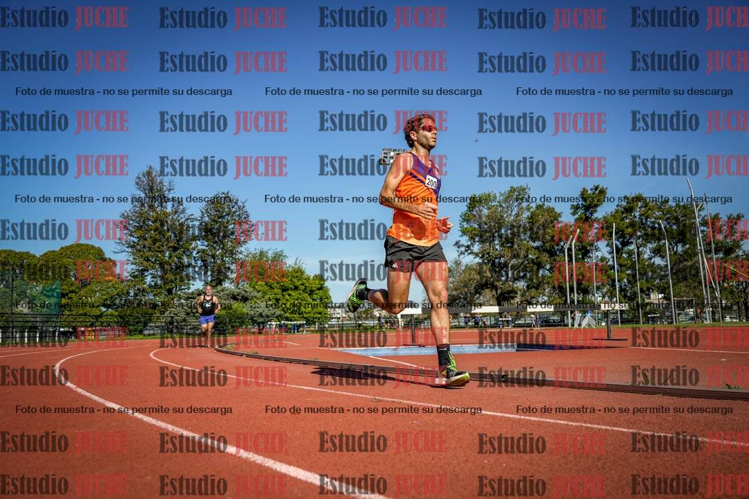 Fotos de los 5000 m llanos de mujeres y varones