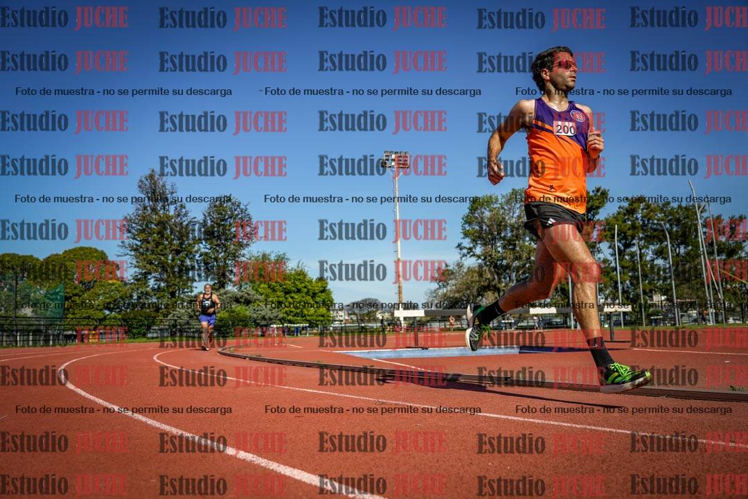 Fotos de los 5000 m llanos de mujeres y varones
