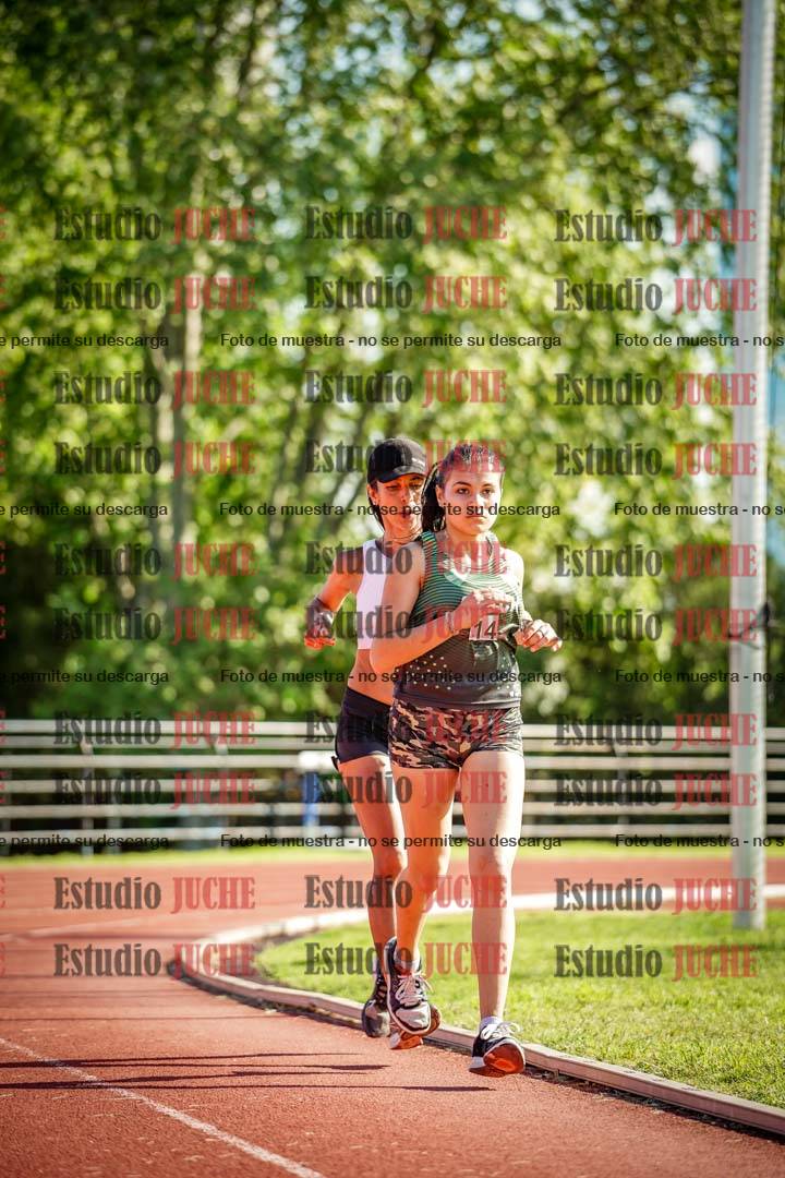 Fotos de los 5000 m llanos de mujeres y varones