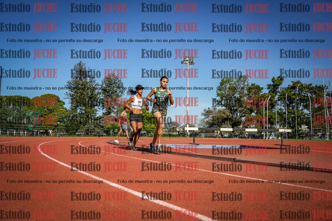 Fotos de los 5000 m llanos de mujeres y varones