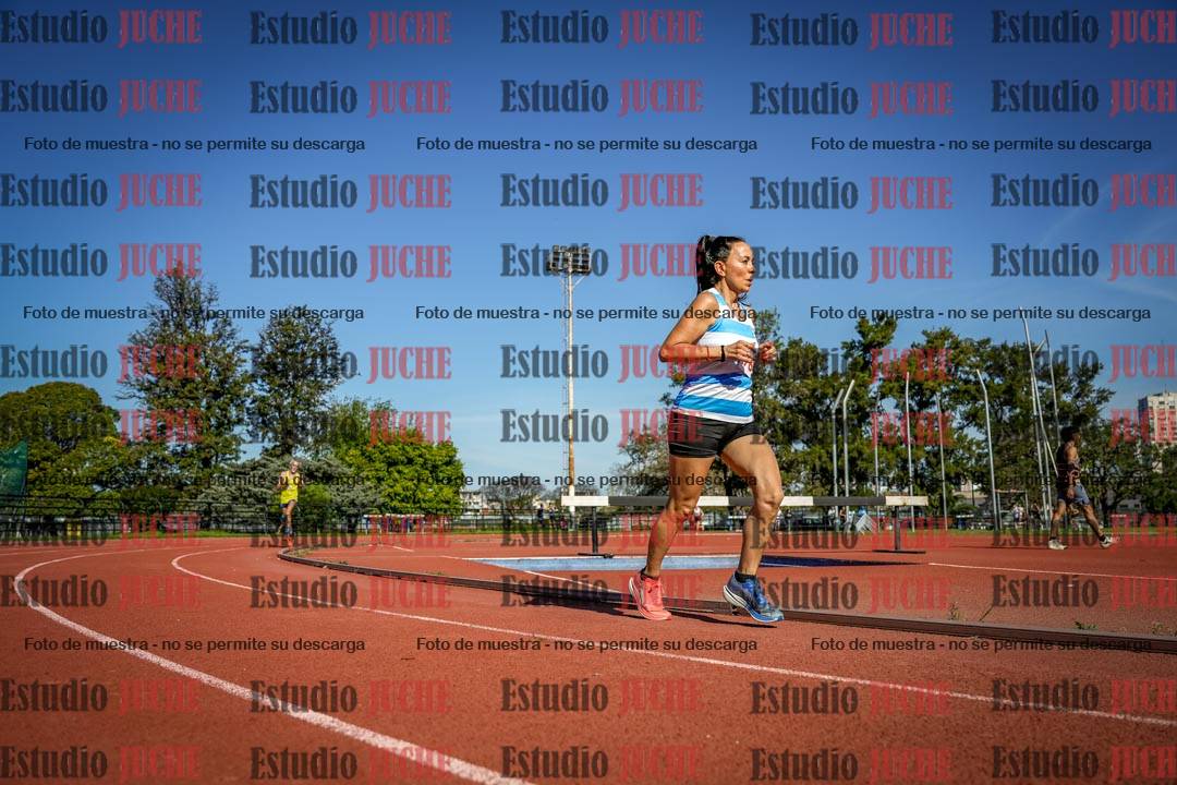 Fotos de los 5000 m llanos de mujeres y varones