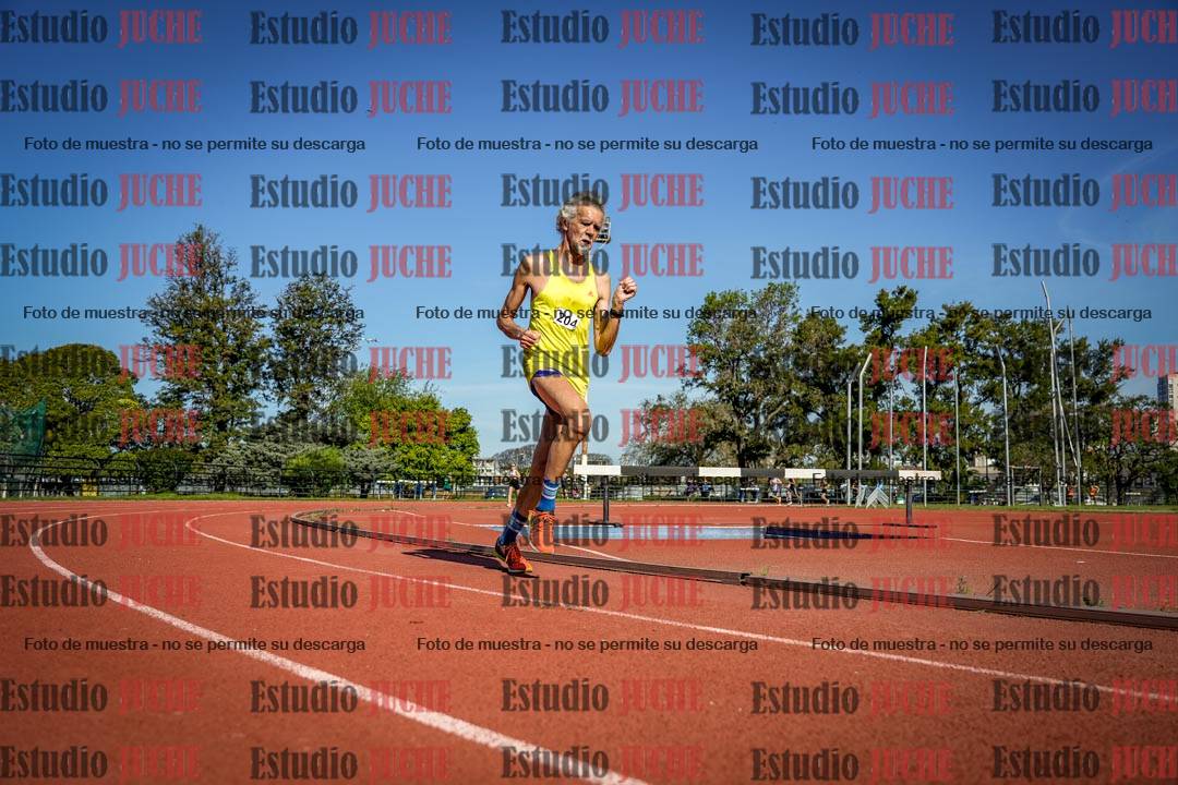 Fotos de los 5000 m llanos de mujeres y varones