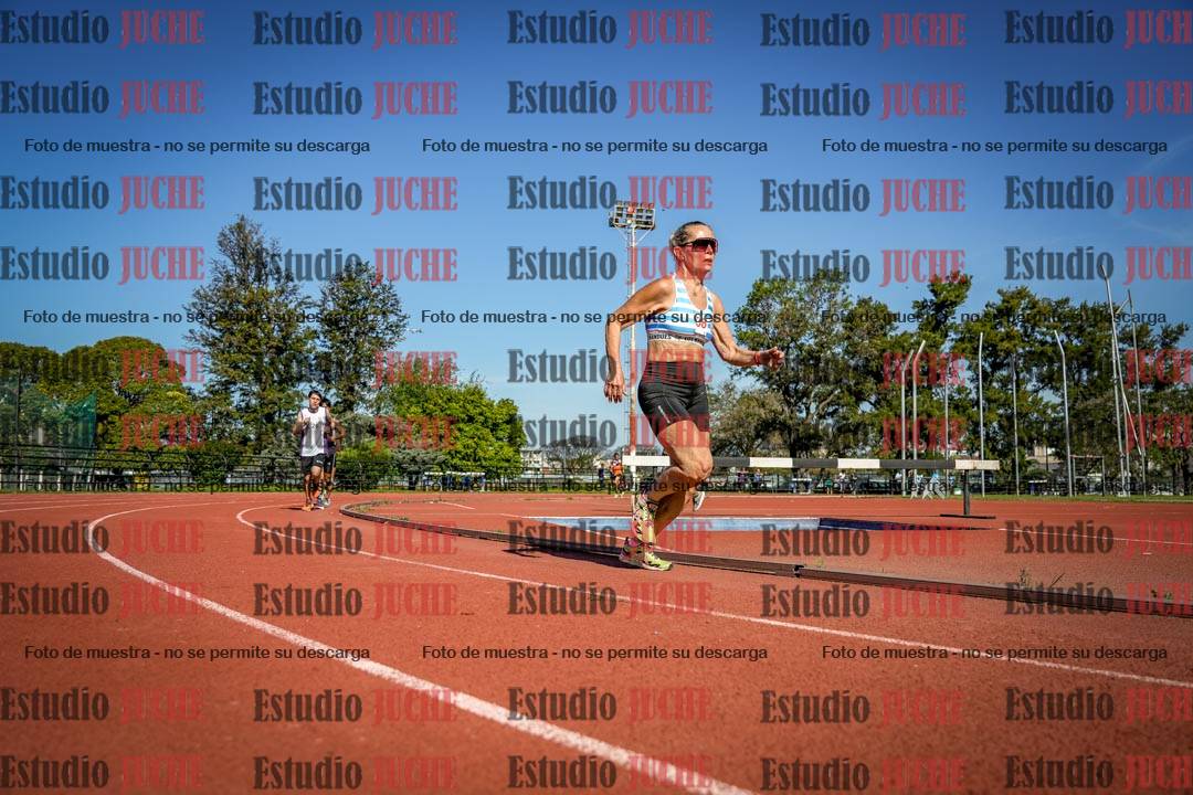 Fotos de los 5000 m llanos de mujeres y varones