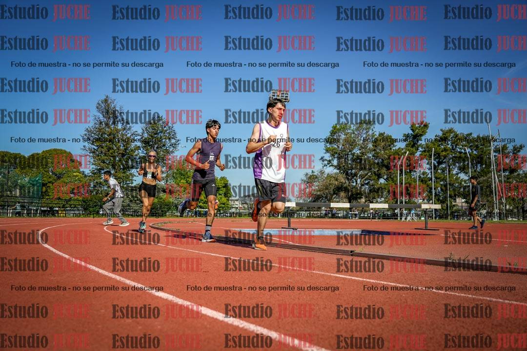 Fotos de los 5000 m llanos de mujeres y varones
