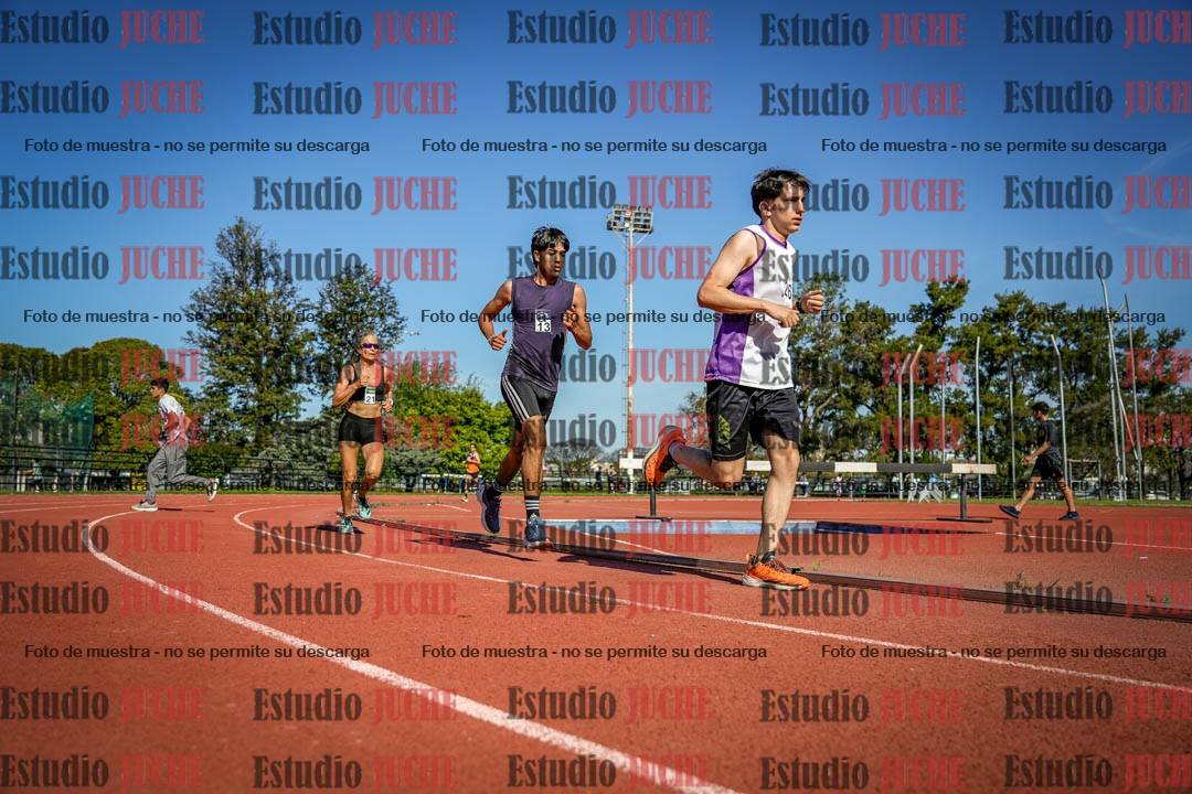Fotos de los 5000 m llanos de mujeres y varones