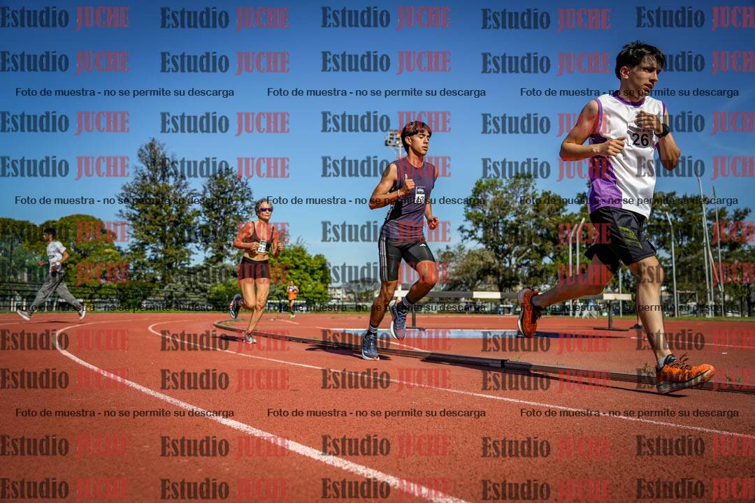 Fotos de los 5000 m llanos de mujeres y varones