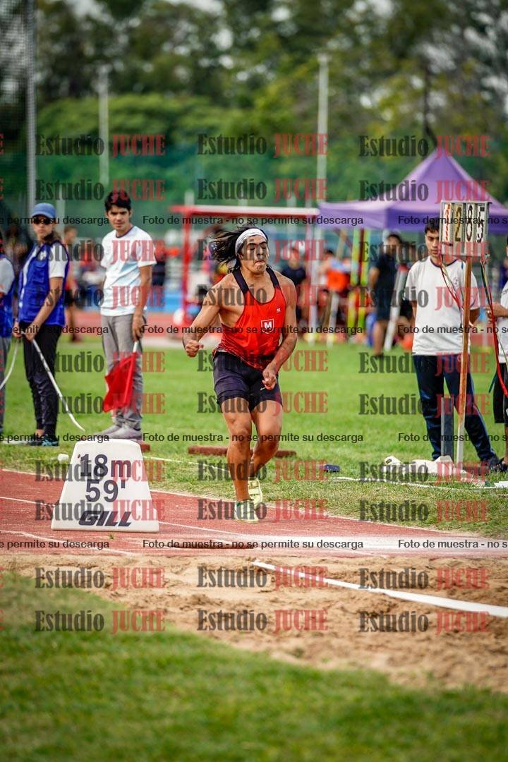 Fotos del salto triple de mujeres y varones