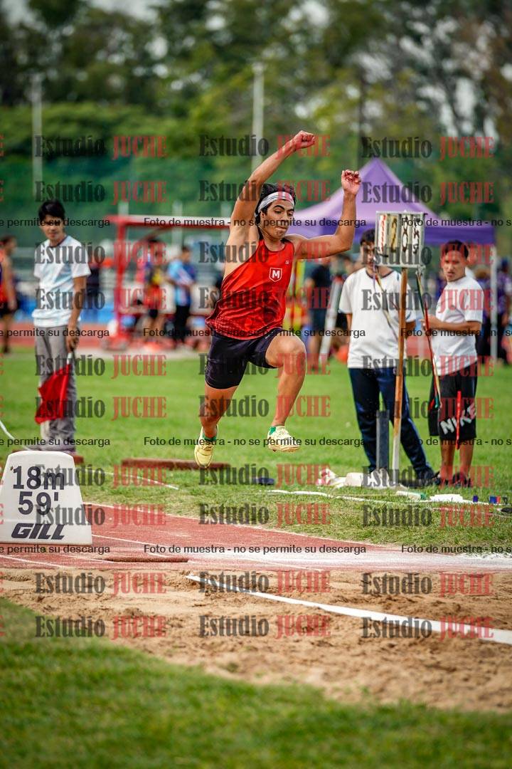 Fotos del salto triple de mujeres y varones