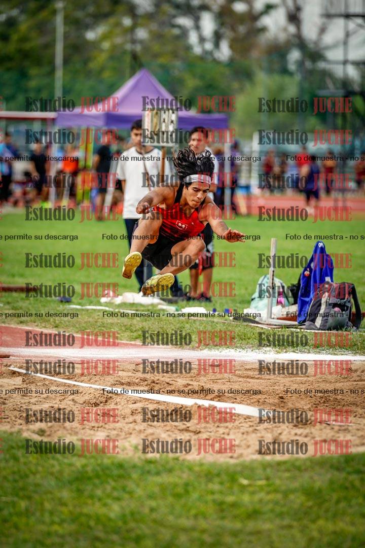 Fotos del salto triple de mujeres y varones