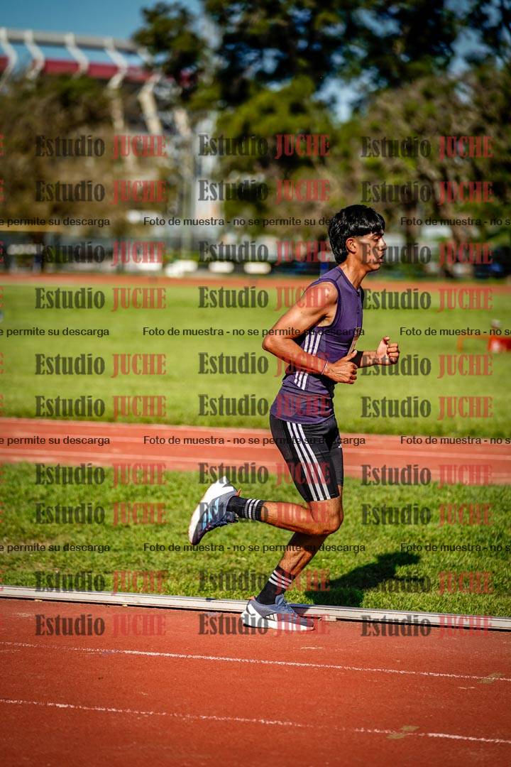 Fotos de los 5000 m llanos de mujeres y varones