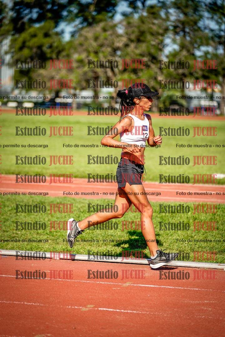 Fotos de los 5000 m llanos de mujeres y varones