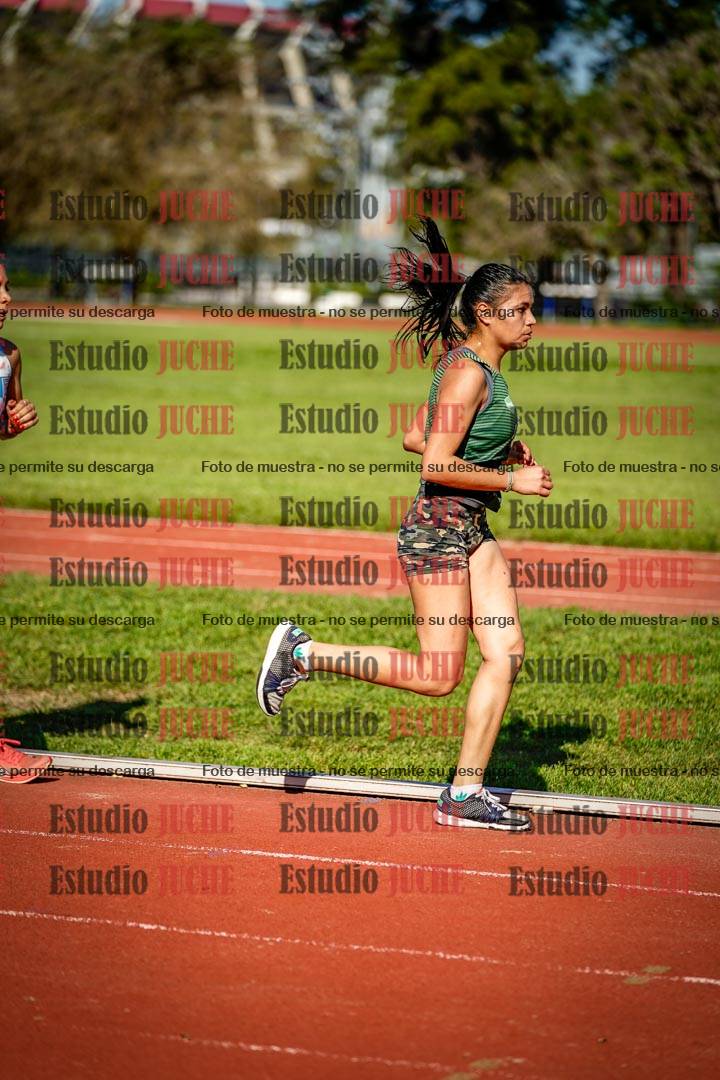 Fotos de los 5000 m llanos de mujeres y varones