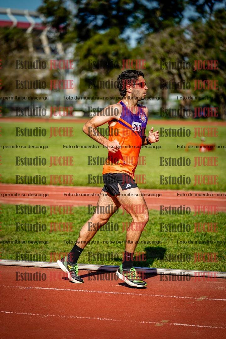 Fotos de los 5000 m llanos de mujeres y varones