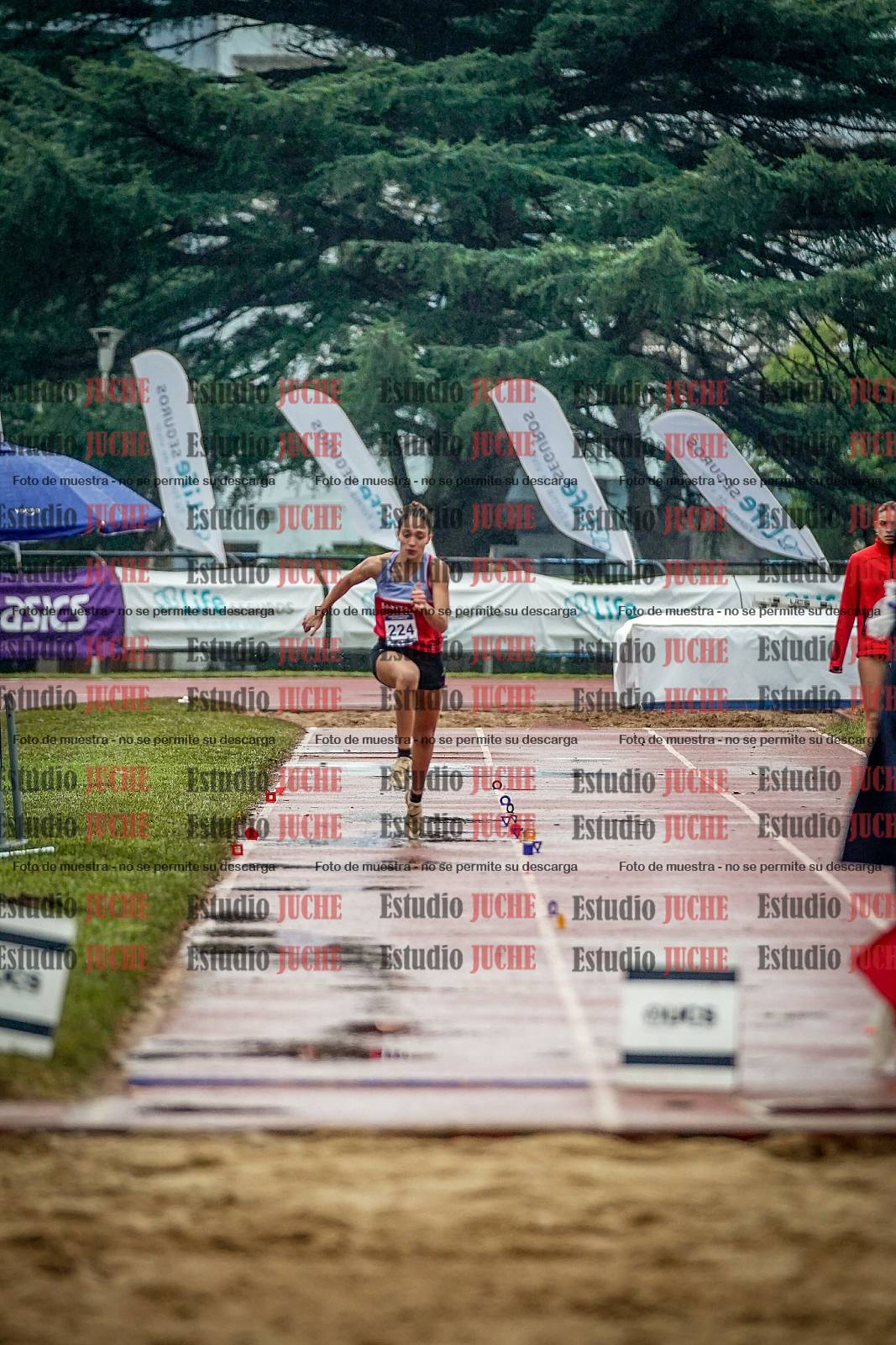Fotos del salto en largo de mujeres