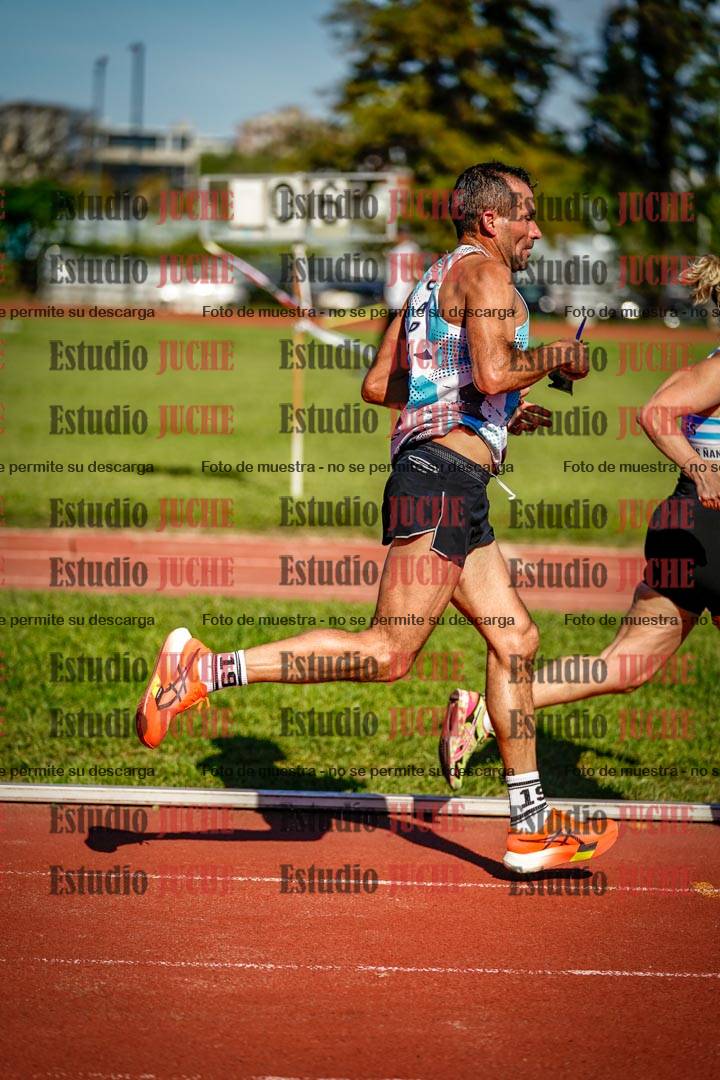 Fotos de los 5000 m llanos de mujeres y varones