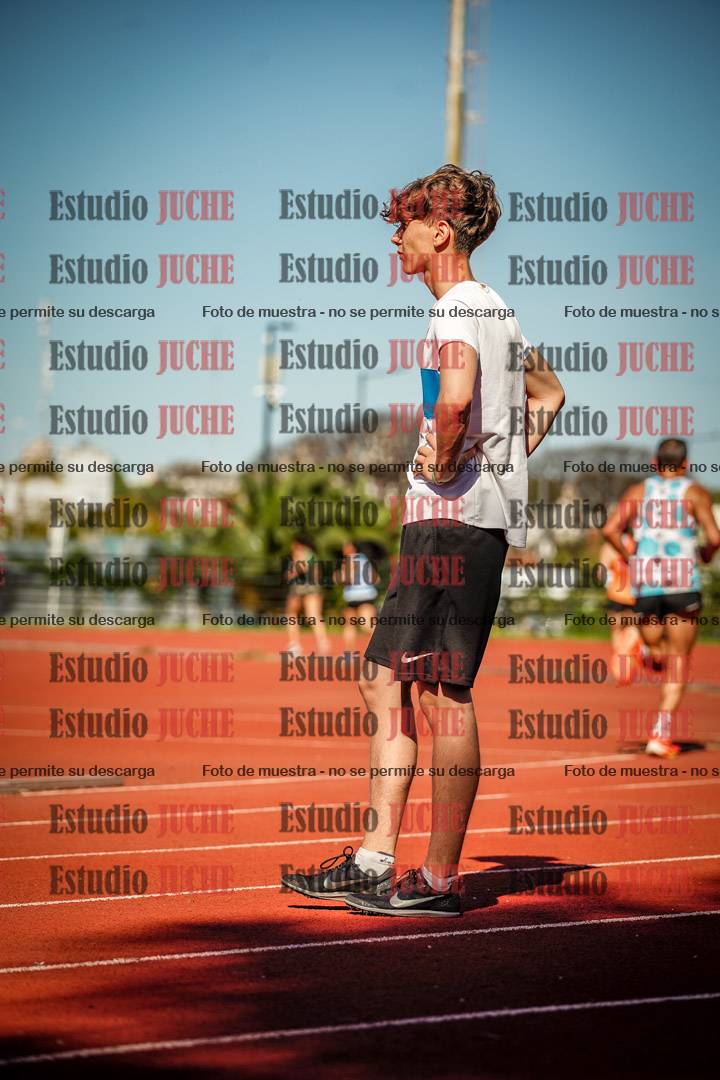 Fotos de los 5000 m llanos de mujeres y varones