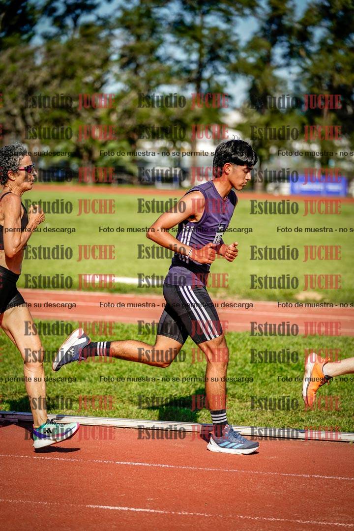 Fotos de los 5000 m llanos de mujeres y varones