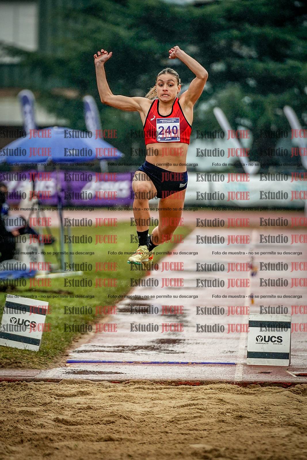 Fotos del salto en largo de mujeres