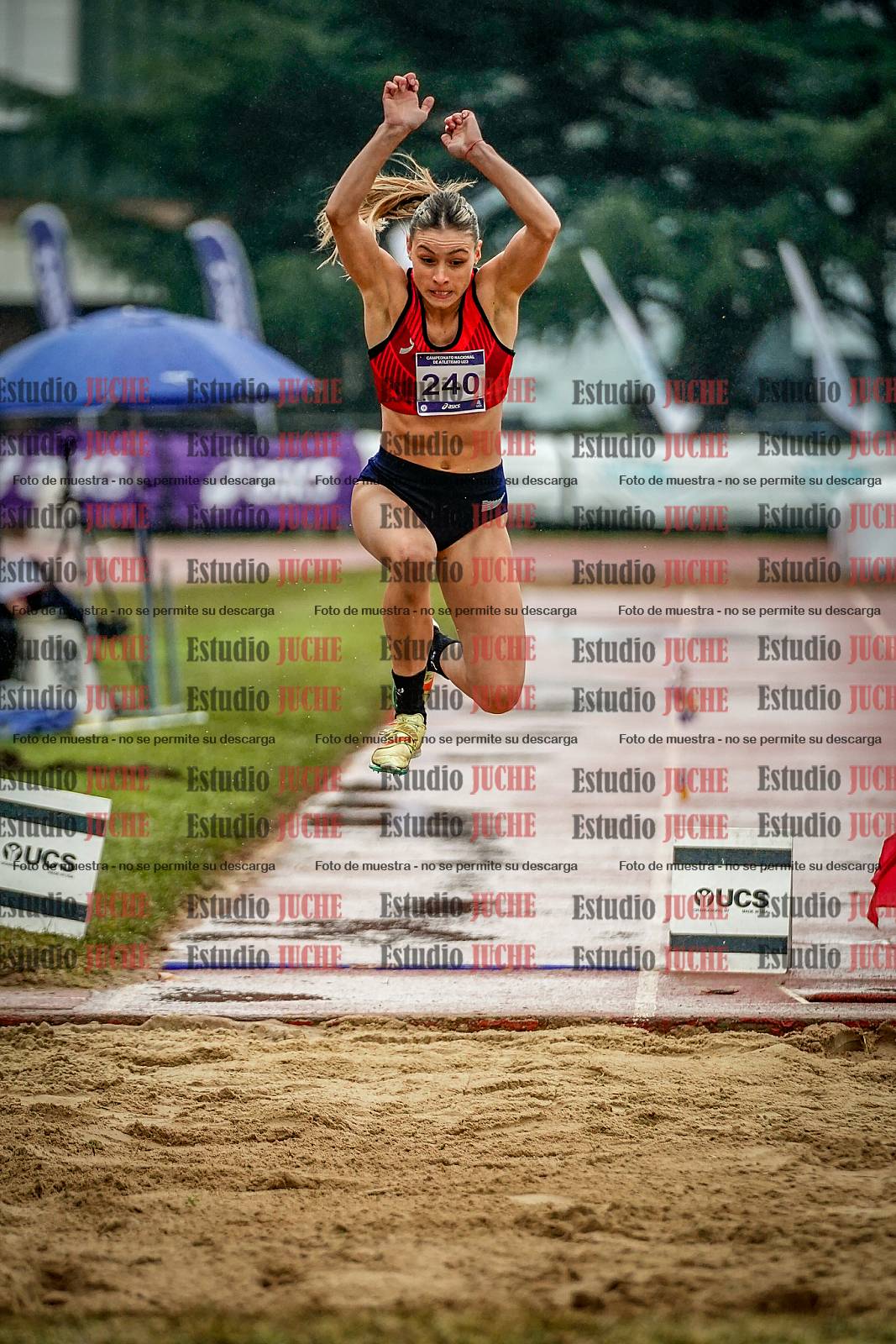 Fotos del salto en largo de mujeres