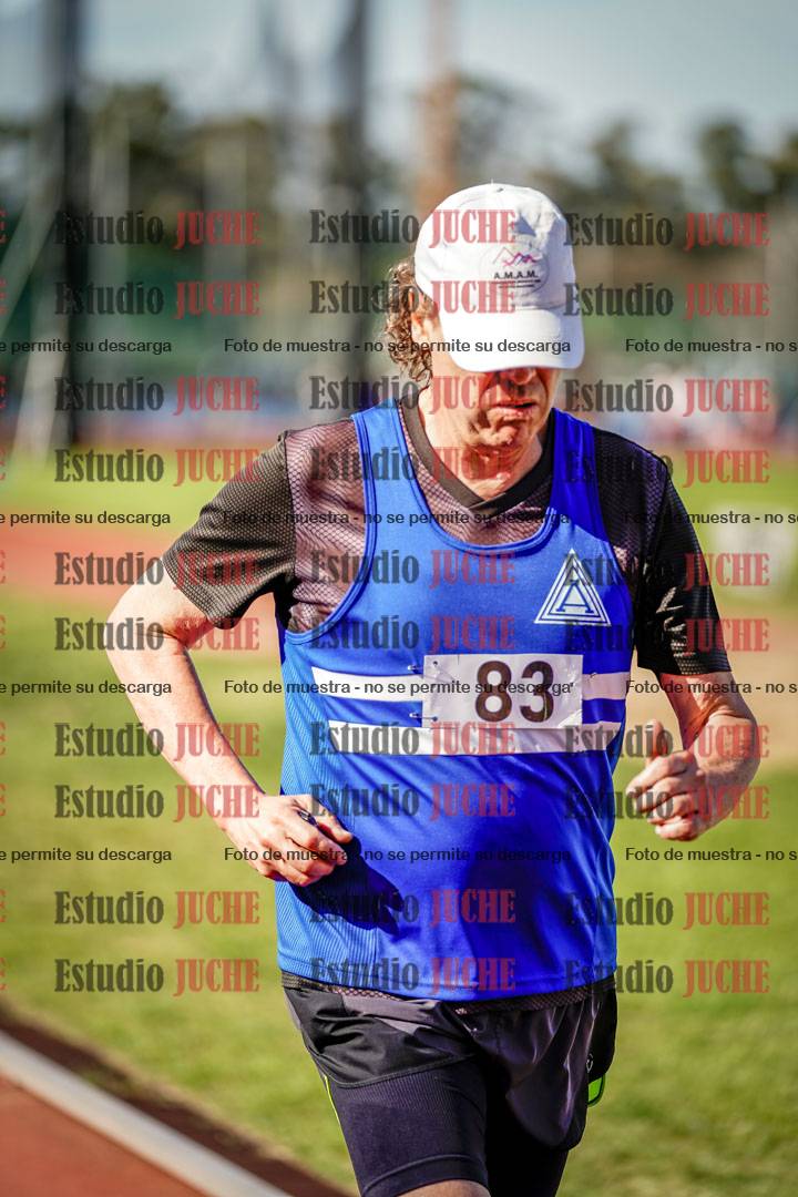 Fotos de los 5000 m llanos de mujeres y varones