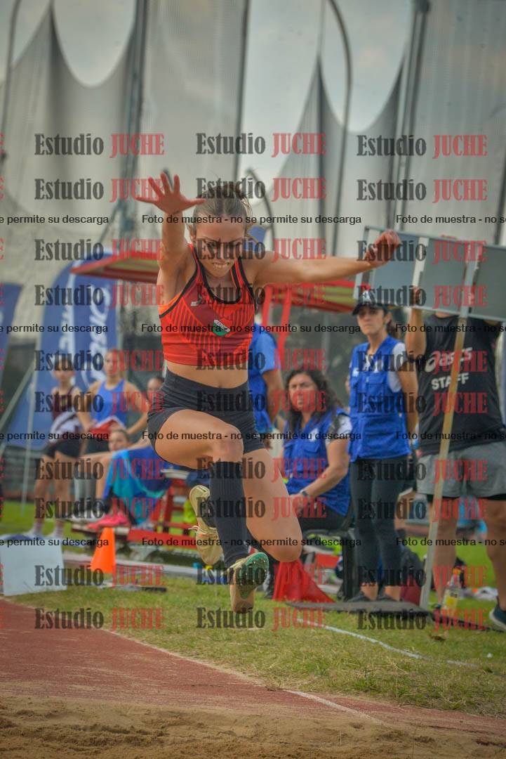 Fotos del salto en largo de mujeres