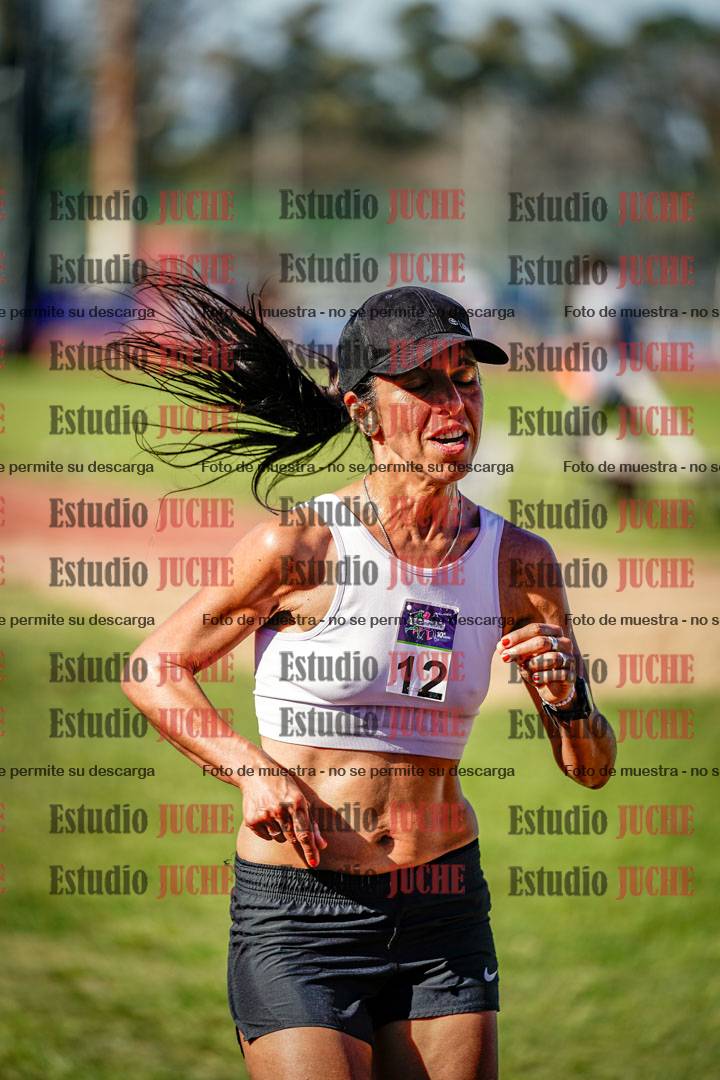 Fotos de los 5000 m llanos de mujeres y varones