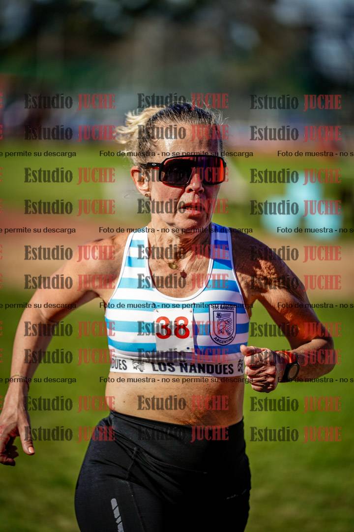 Fotos de los 5000 m llanos de mujeres y varones