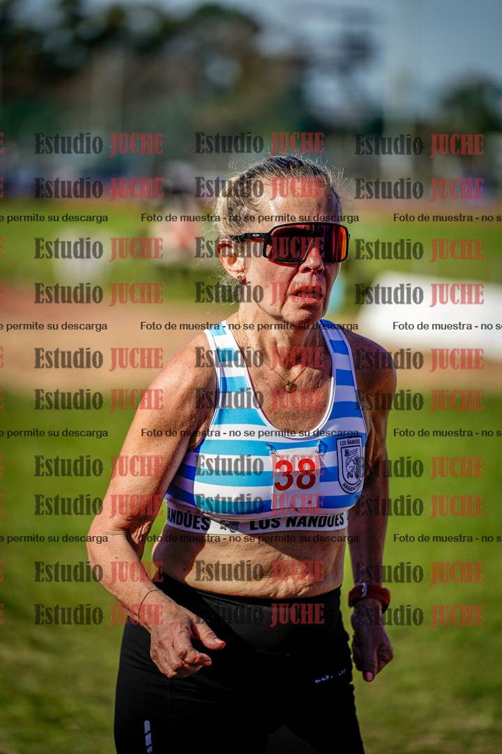 Fotos de los 5000 m llanos de mujeres y varones