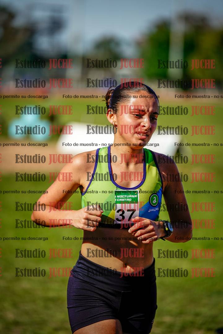 Fotos de los 5000 m llanos de mujeres y varones