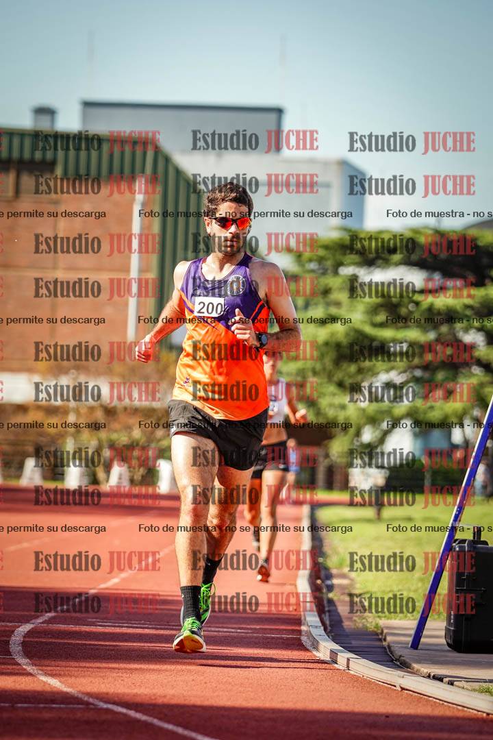Fotos de los 5000 m llanos de mujeres y varones