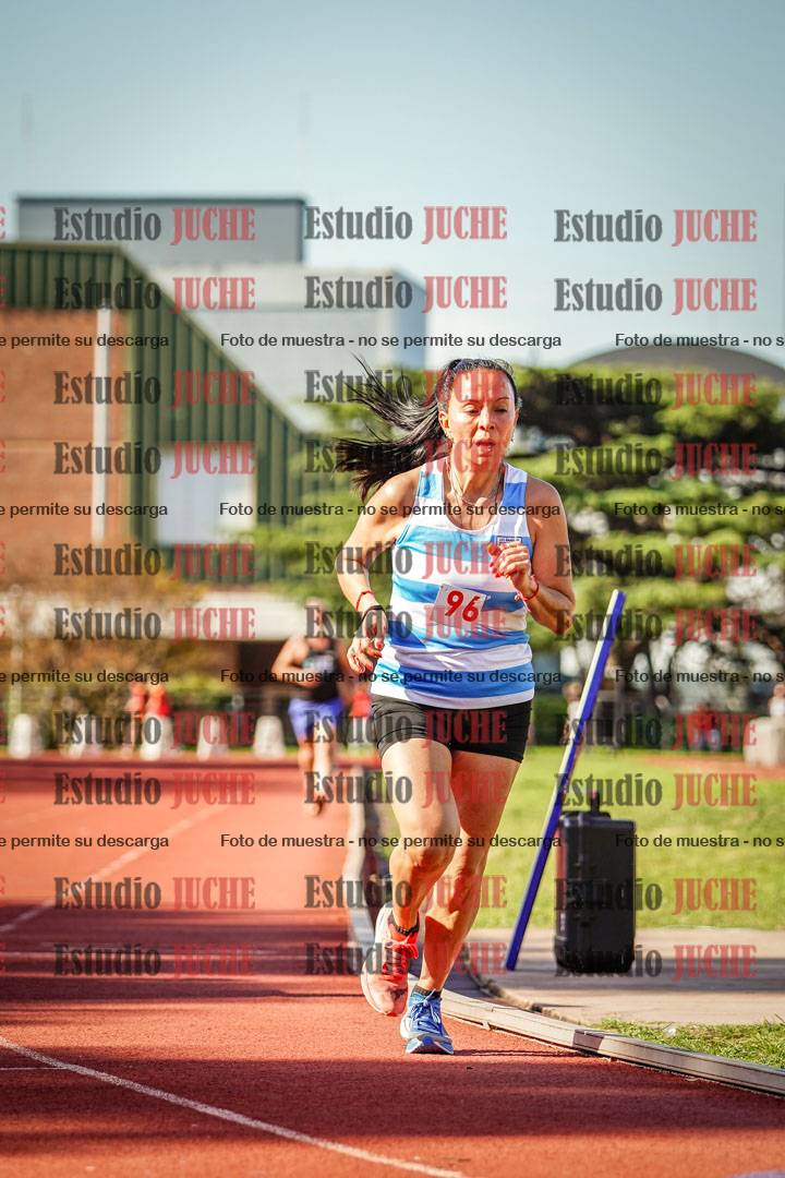 Fotos de los 5000 m llanos de mujeres y varones