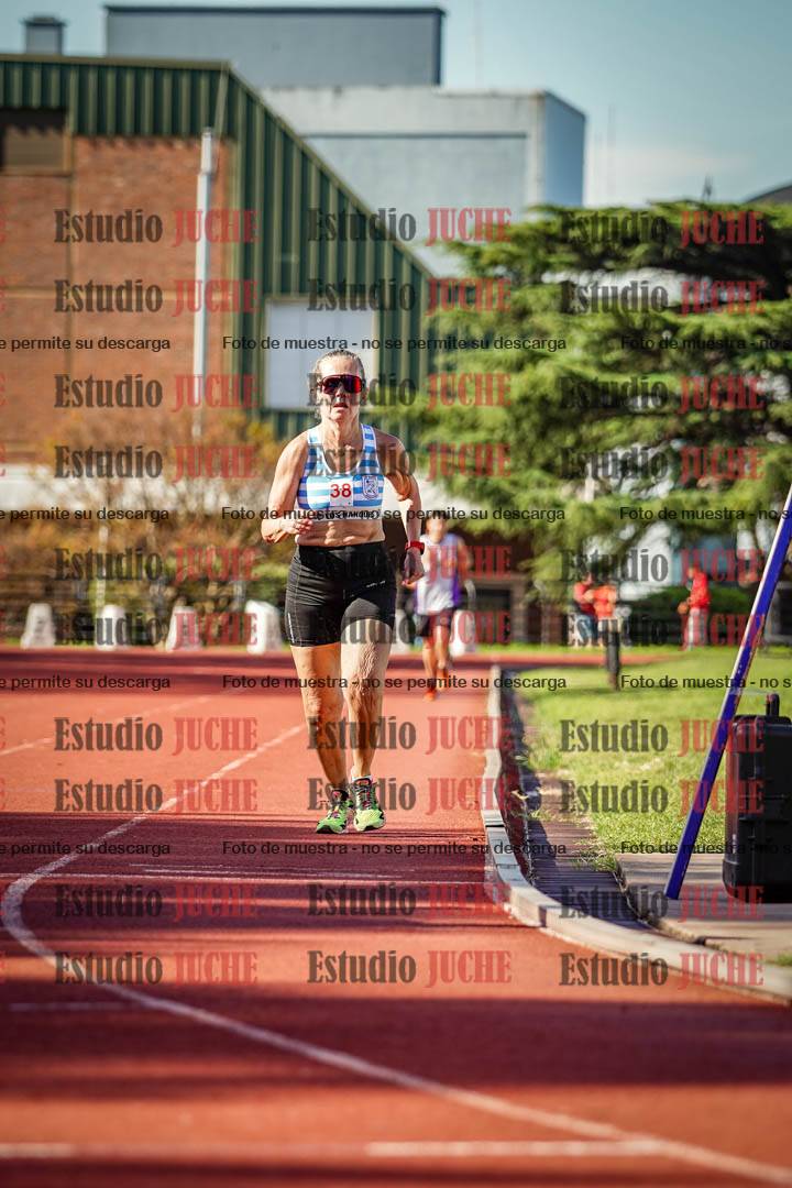Fotos de los 5000 m llanos de mujeres y varones