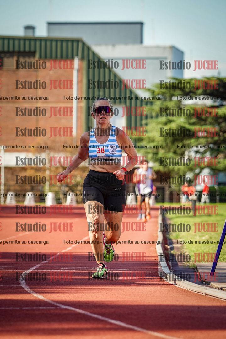 Fotos de los 5000 m llanos de mujeres y varones