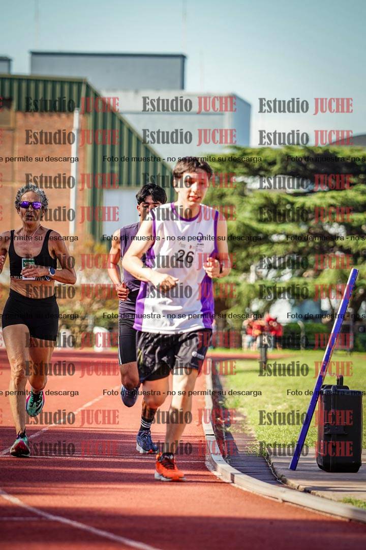 Fotos de los 5000 m llanos de mujeres y varones