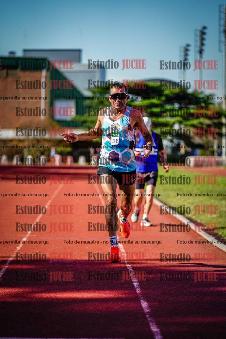 Fotos de los 5000 m llanos de mujeres y varones