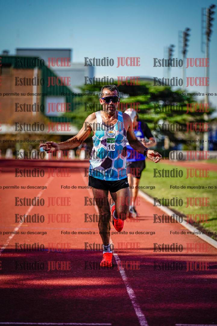 Fotos de los 5000 m llanos de mujeres y varones