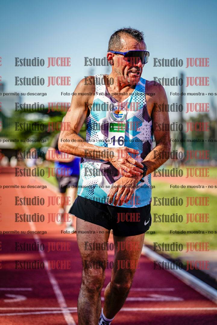 Fotos de los 5000 m llanos de mujeres y varones
