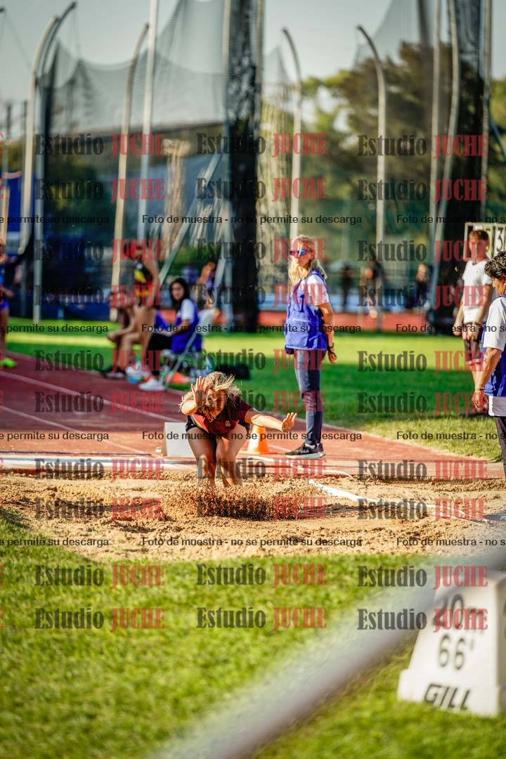 Fotos del salto en largo de mujeres