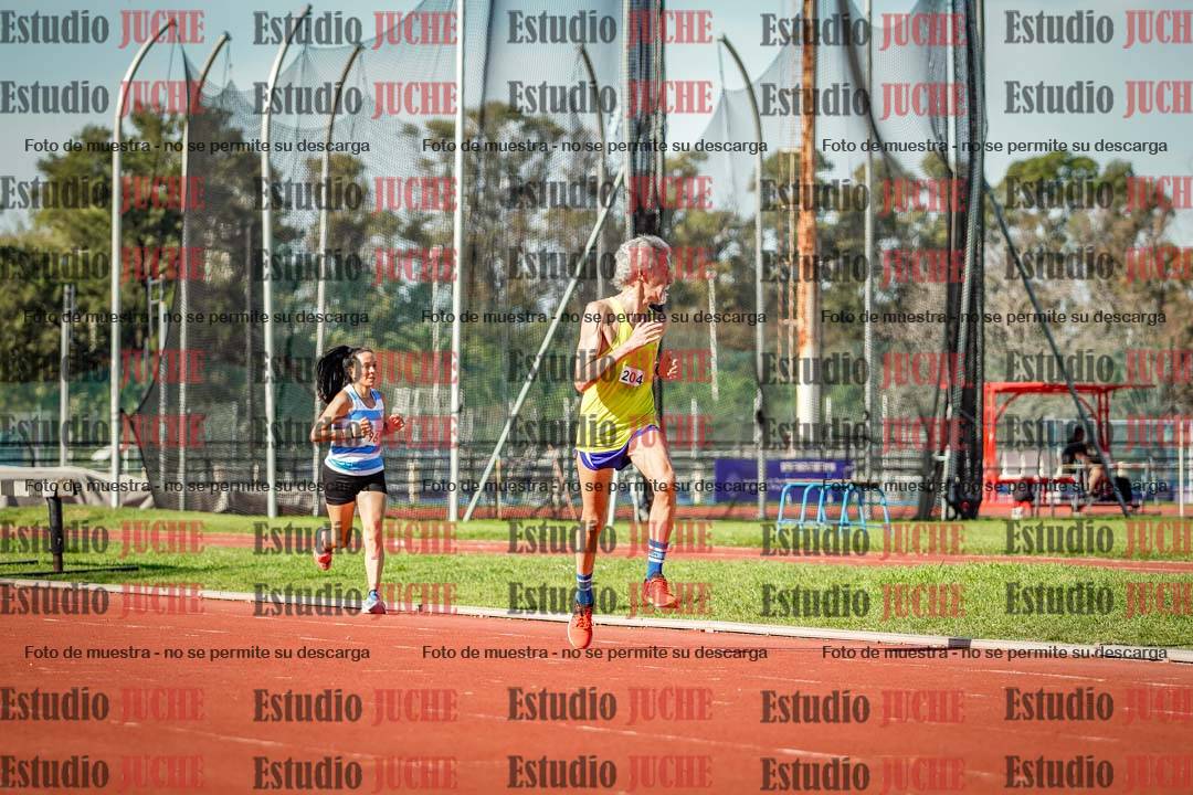 Fotos de los 5000 m llanos de mujeres y varones