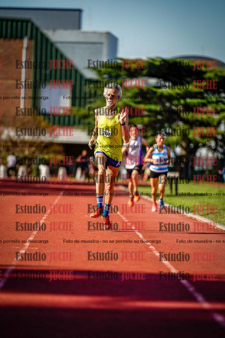Fotos de los 5000 m llanos de mujeres y varones