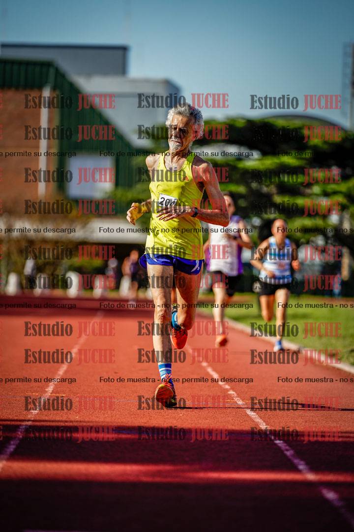 Fotos de los 5000 m llanos de mujeres y varones