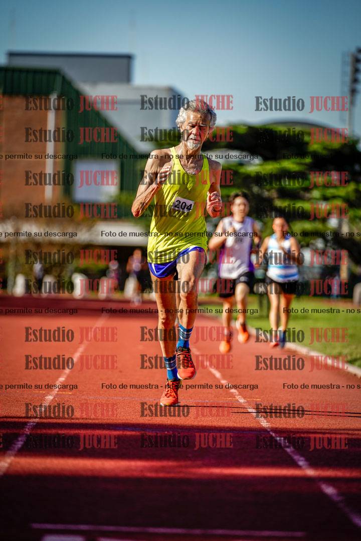 Fotos de los 5000 m llanos de mujeres y varones