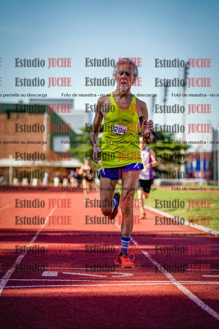 Fotos de los 5000 m llanos de mujeres y varones